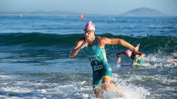 Matthew Hauser comes out of the water at the Moo Tri